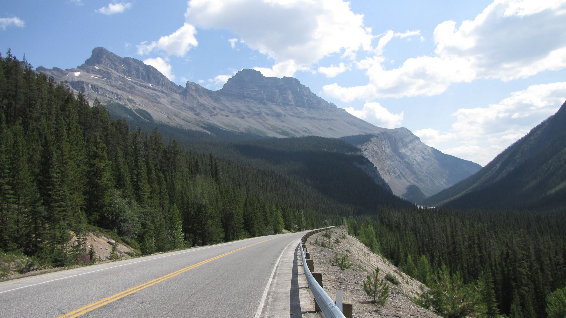 The Icefields Parkway, Alberta, Canada - they built a road through this! Part of me is glad, because I could ride it, & part of me wishes they`d left it pristine. Taken during "Part 4" of my 7-month solo ride in 2009 from the Arctic Ocean coast to Mexico, including following the length of the Rocky Mountains