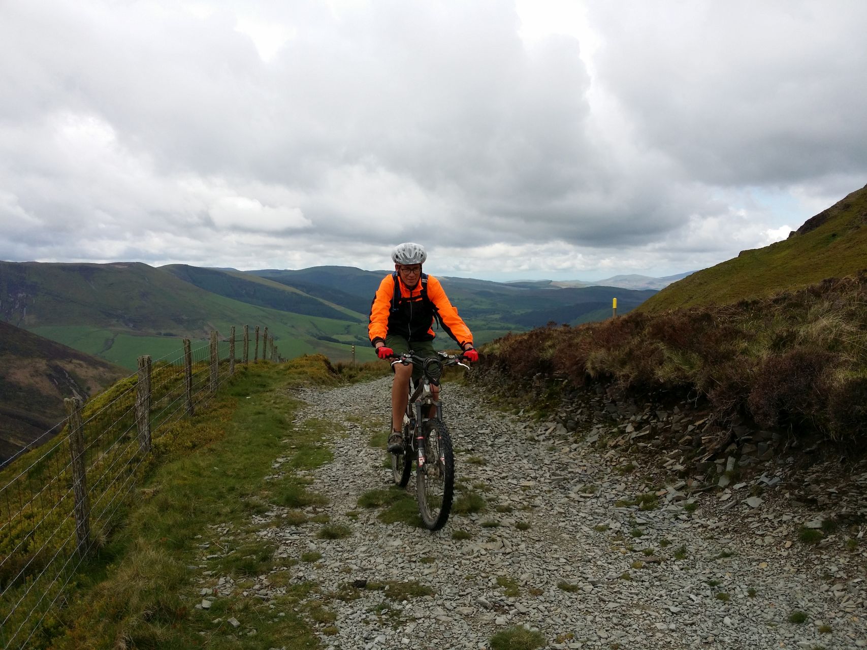 Day 4 - Paul riding up beneath slopes of Foel Fadian