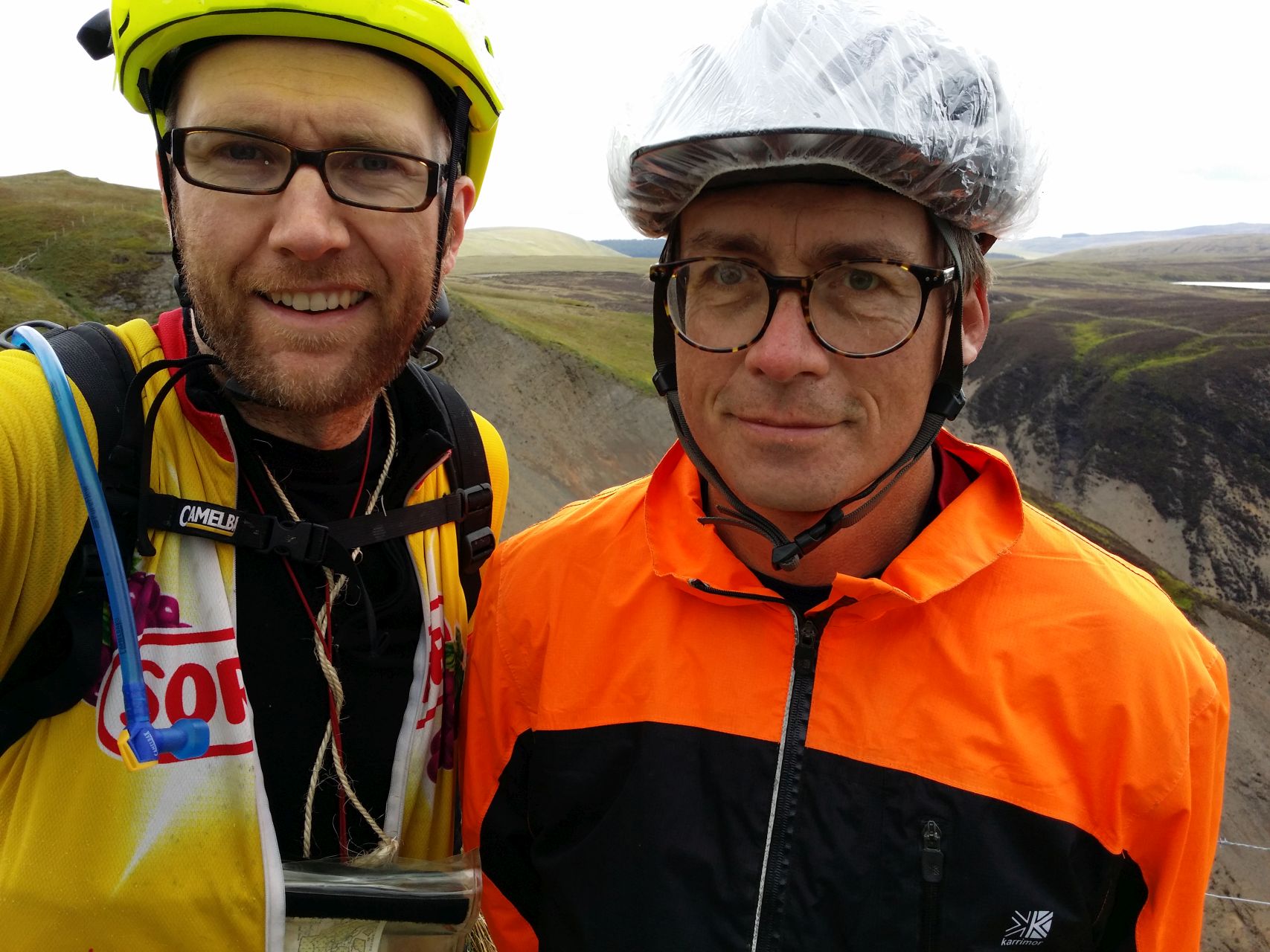 Day 4 - Jon & Paul beneath slopes of Foel Fadian ... Paul wearing a shower cap (yup)