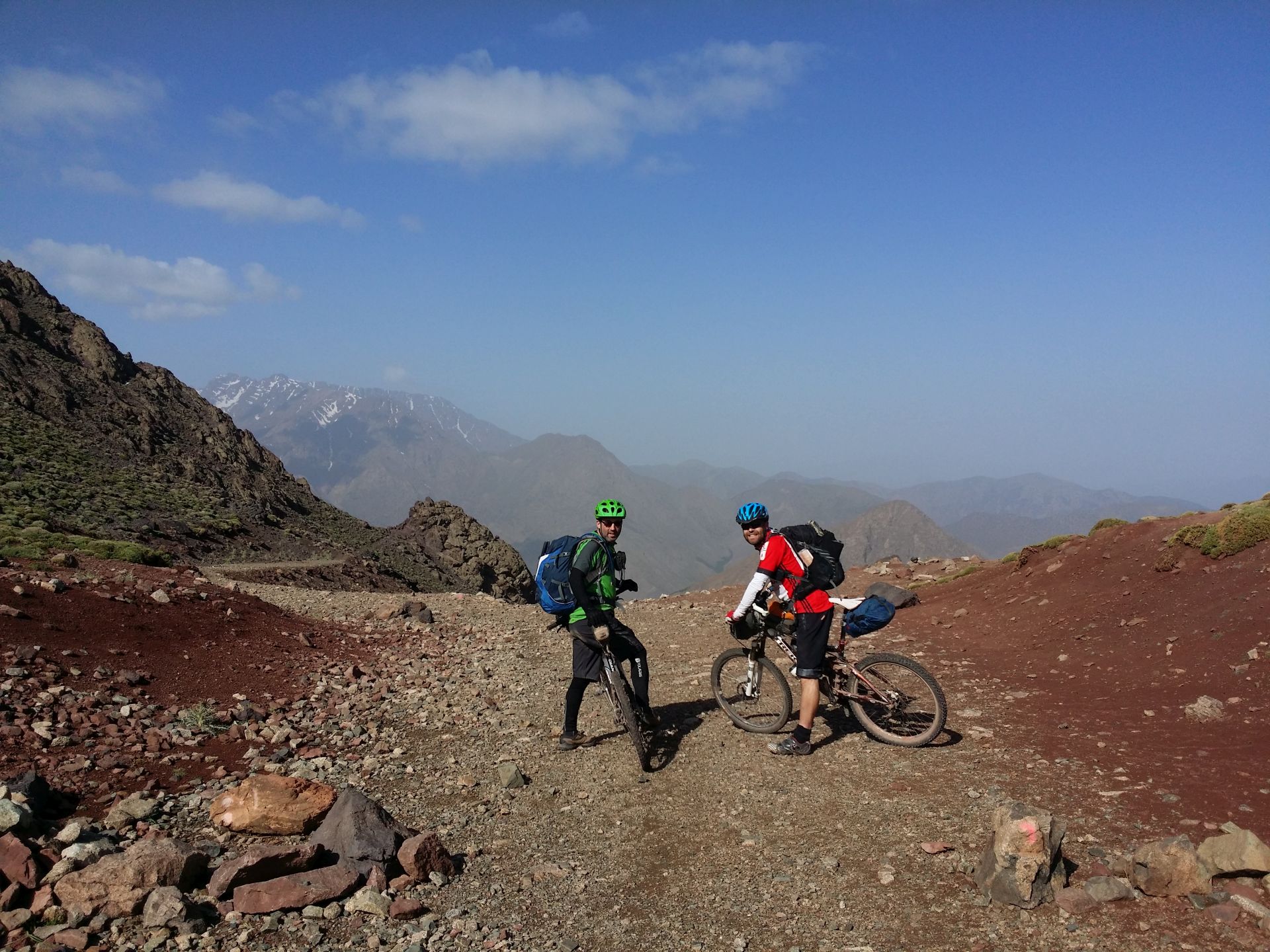 Day 8 - Whizz-kid Shaun & Trails-ace Steve readying for the rock-tastic descent from Tizi-n-Eddi to the village of Tizi-n-Tacheddirt. Jbel Aksoual (12,828 ft) is the highest peak on the horizon, on the left.