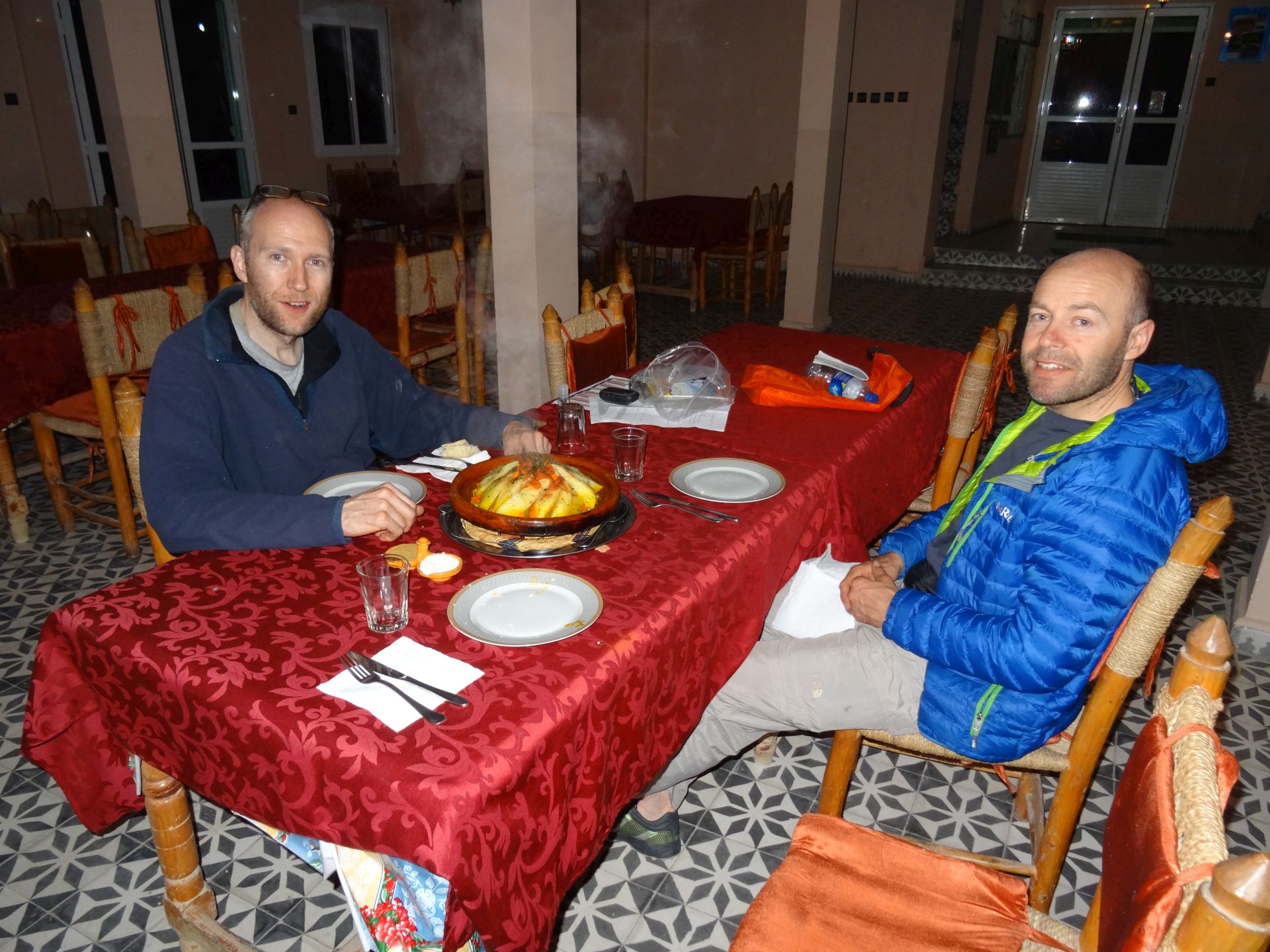 Transfer Day A  - Hungry boys Jon (left) & Shaun (right) ready themselves to inhale Tagine dinner before Steve puts camera down ... Hotel Izlane, Imilchil. © Steve Woodward