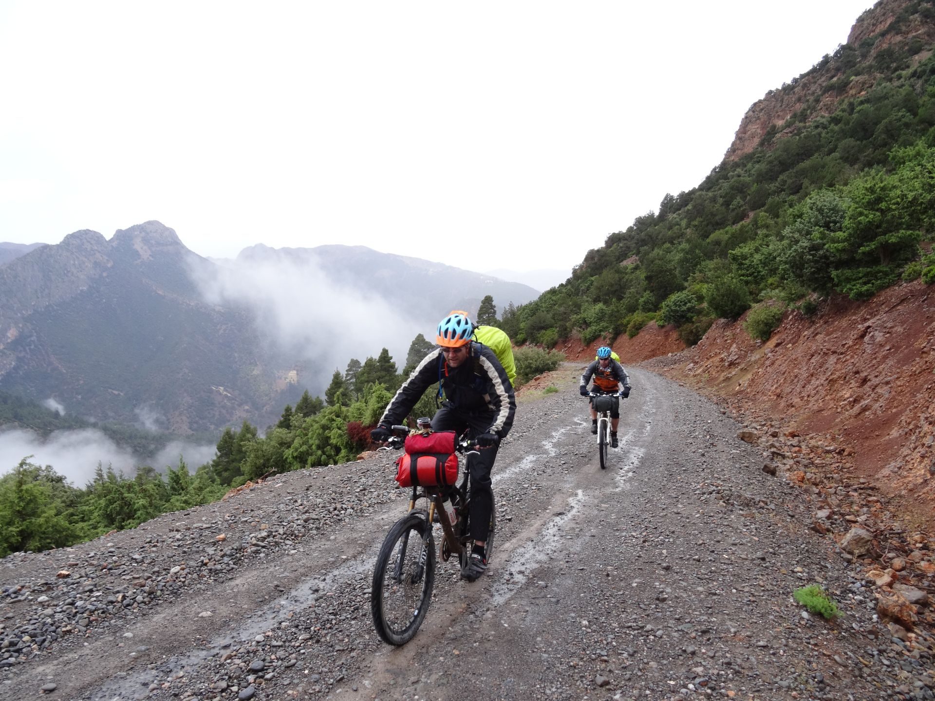 Day 2 - A really, really tough day on the bikes! The grind in the rain toward Zawyat Ahansal, & our accommodation for the night. © Steve Woodward