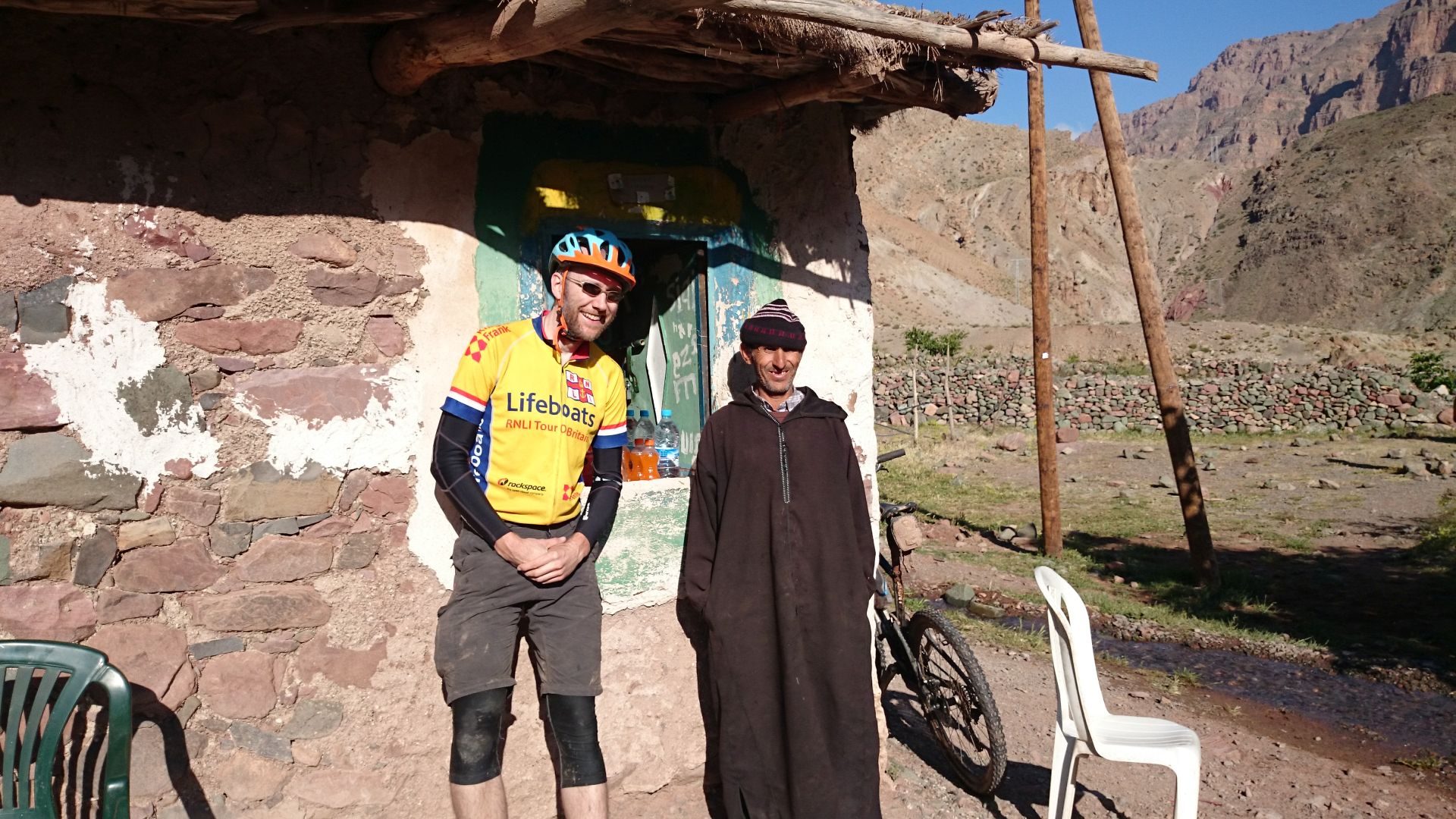 Day 5 - Smiley Si Moh at his serving hatch - we mostly bought orange liquids full of sugar! Near Ichbbakene, Tassaout valley. © Shaun Grey