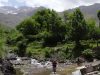 Day 8 - Splish Splash Splosh, & nearly Bish Bash Bosh! Wheel dip in the Assif Imenane river, leaving Tizi-n-Tacheddirt, en route to Imlil, before our final day of riding, tomorrow. Bou Iguenouane (12,736 ft) on left, Jbel Aksoual (12,828 ft) right - form part of a 10-mile ridge traverse for another time! © Steve Woodward