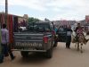 Transfer Day A - Our driver, Abdel, prepares to negotiate carpet movement (left) while child takes test for muleteer licence (right). Lunch stop in the market town of El Ksiba, during our transfer by pick-up from Marrakesh  to Imilchil, where we`ll start the ride. © Shaun Grey