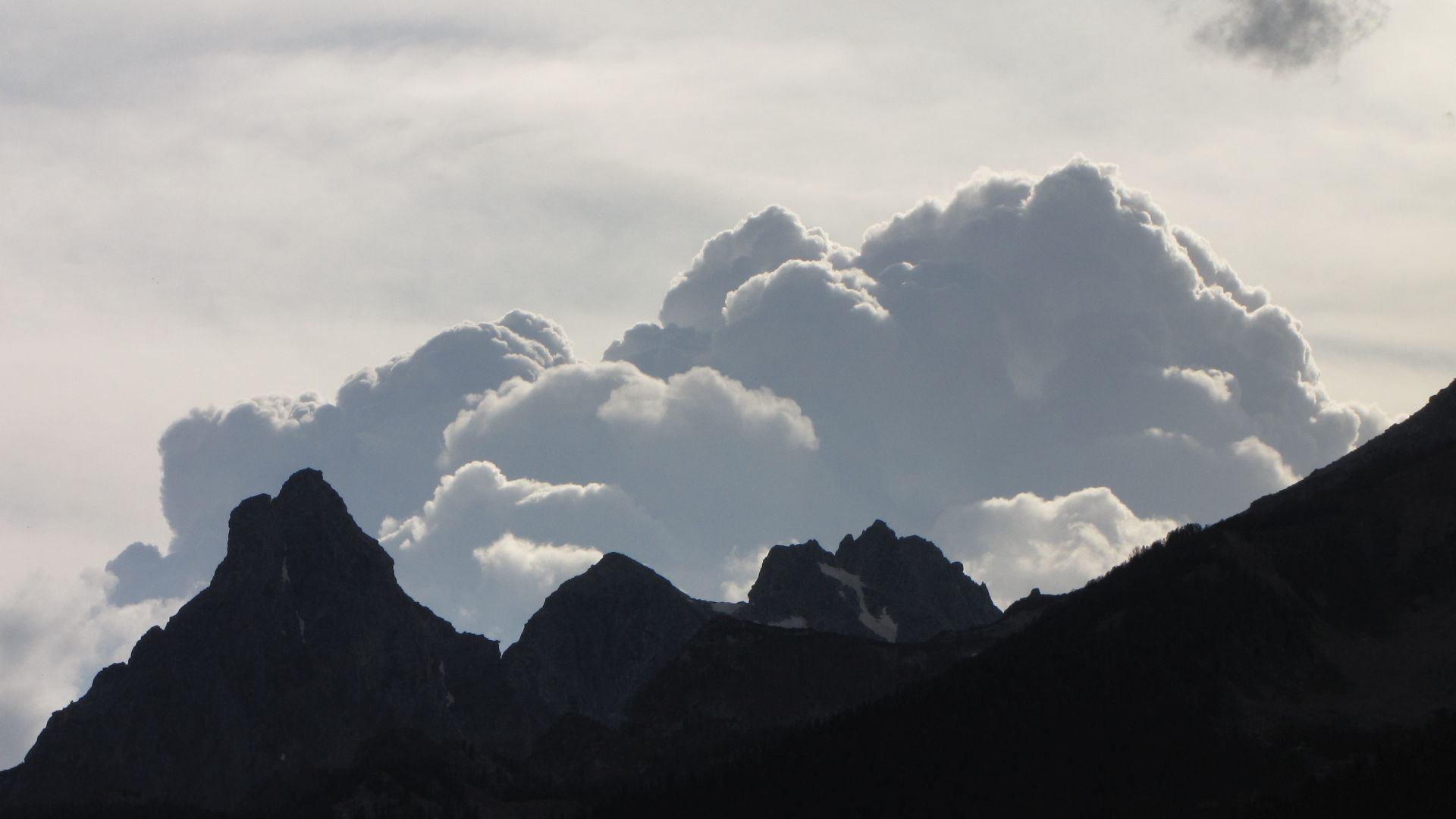Grand Teton Nat Pk, WY, USA - Biblically proportioned storm building in front of my very eyes...eek!  Pedal faster!