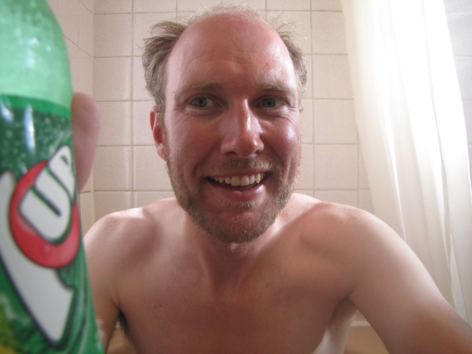 Eureka, Montana, USA - Happy man in bath