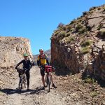 Day 6 - We made it through the rock cleft! Near Tamzrit. © Shaun Grey