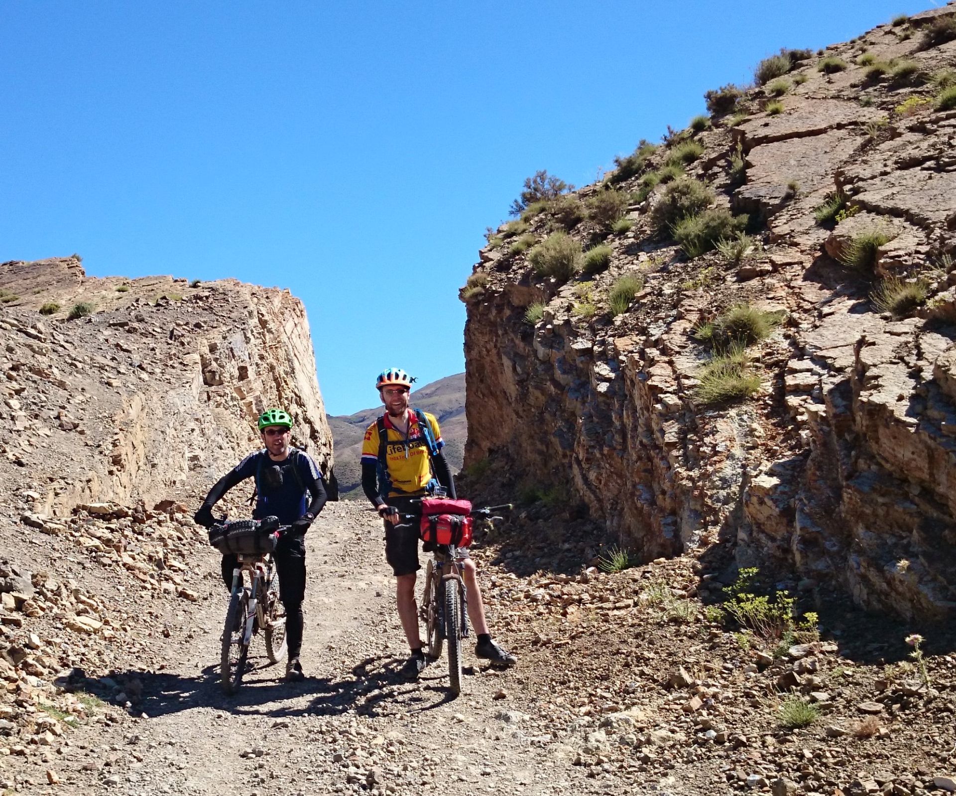 Day 6 - We made it through the rock cleft! Near Tamzrit. © Shaun Grey