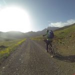 Day 8 - Are we nearly there yet dad? Riding through an alpine meadow filled with yellow flowers of the plant Woad (Isatis tinctoria). On the climb up to the high point of our trip, the Tizi-n-Eddi pass (9,606 ft) from Oukaïmeden